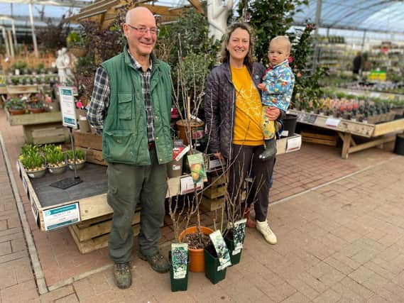 Budding Foundation founder, Clive Gravett hands over donated trees to Anna Franklin of Friends of Alfriston Playground.