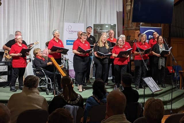Broadwater Community Choir performing at Independent Lives' community concert.