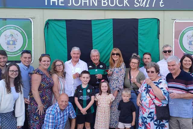 The boardroom at Burgess Hill Town Football Club has been named after long-serving volunteer and club legend John Buck
