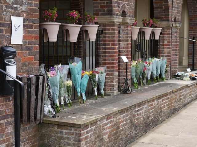 Family, friends and members of the public laid flowers in his memory.