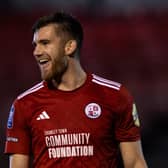 Crawley Town defender Harry Ransom all smiles after his side beat Bristol Rovers in the EFL Trophy | Picture: Eva Gilbert