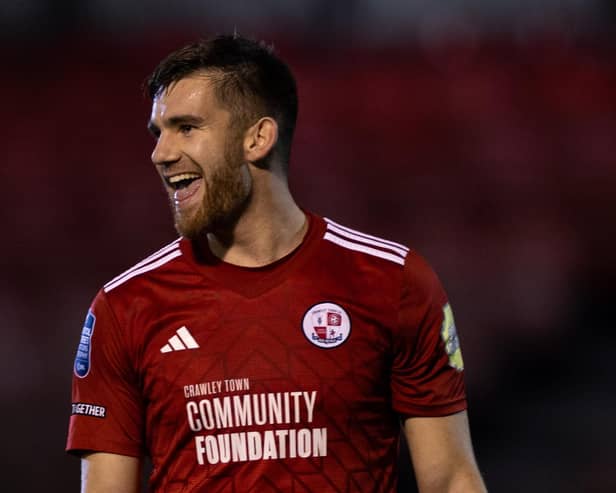 Crawley Town defender Harry Ransom all smiles after his side beat Bristol Rovers in the EFL Trophy | Picture: Eva Gilbert