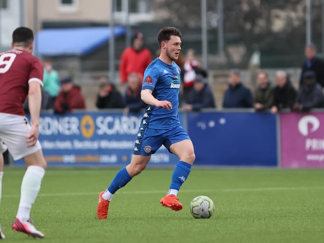 Action between Worthing and Hastings United in the Sussex Senior Cup semi-final at Lancing
