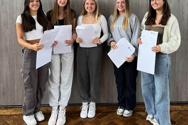 Charlotte Newham (left) with fellow students from The Burgess Hill Academy