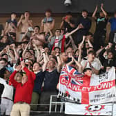 The Crawley Town supporters celebrate during the EFL Sky Bet League 2 play-off second leg match between Milton Keynes Dons and Crawley Town at stadium:mk, Milton Keynes, England on 11 May 2024 | Picture: Dennis Goodwin/ProSportsImages