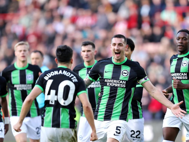 Lewis Dunk celebrates after Facundo Buonanotte of Brighton & Hove Albion scored his team's first goal with teammates during the Premier League match between Sheffield United and Brighton & Hove Albion at Bramall Lane on February 18, 2024 in Sheffield, England. (Photo by Matt McNulty/Getty Images)