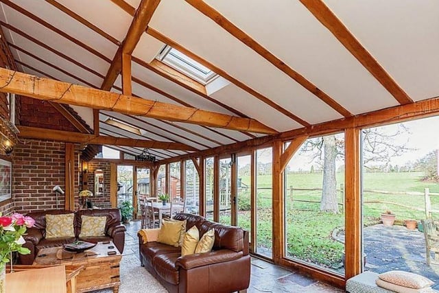 The house's stunning large conservatory has views across open countryside