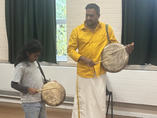 Children and adults came together in Crawley to discover the powerful rhythms of Parai, a traditional Tamil drumming art form, at a community workshop organised by Aurvi Collective