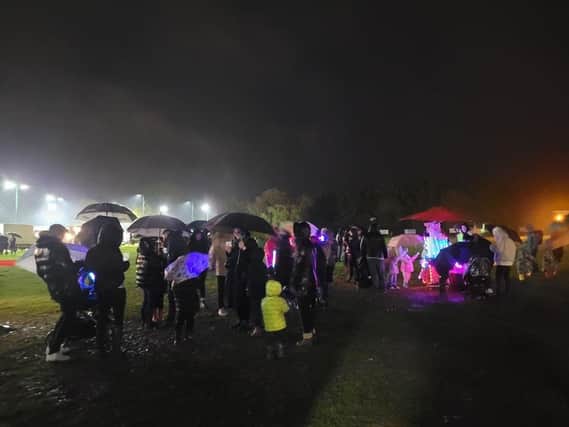 Crowds braved torrential rain to attend Horsham Fireworks but some said: 'It should have been called off'.