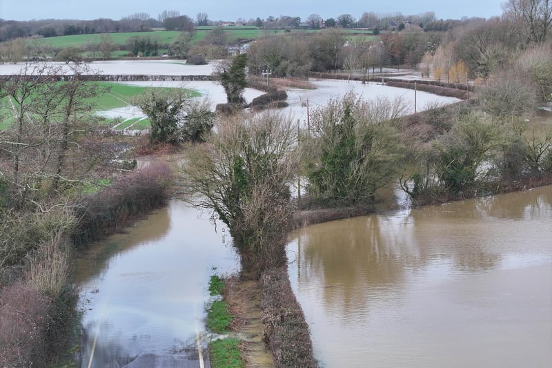 A road off the A26 remains closed following heavy rainfall last week which has submerged a village near Lewes.