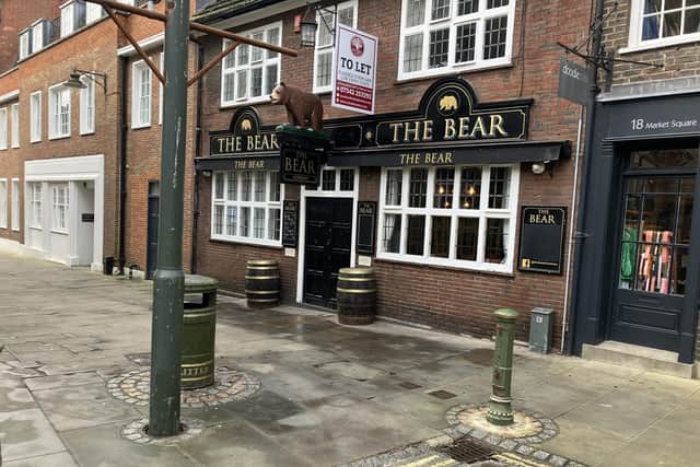 The Bear pub in Market Square, Horsham, has announced its sudden closure