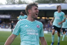 Laurence Maguire celebrates his goal against Stockport County | Picture: Crawley Town