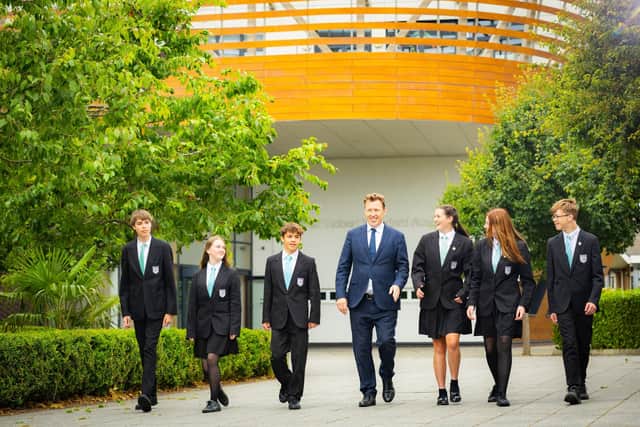 Principle Kieran Scanlon with students at The Sir Robert Woodard Academy. (Photo contributed)