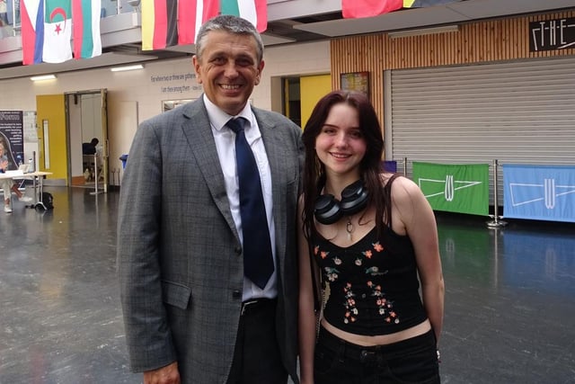 St Wilfrid's headteacher Mr Ferry with Anna Helicka - who achieved three grade 9s