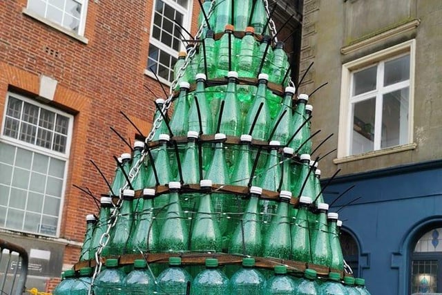 Bexhill's Young Pollinators with their Green Bottle Christmas Tree in Devonshire Square.