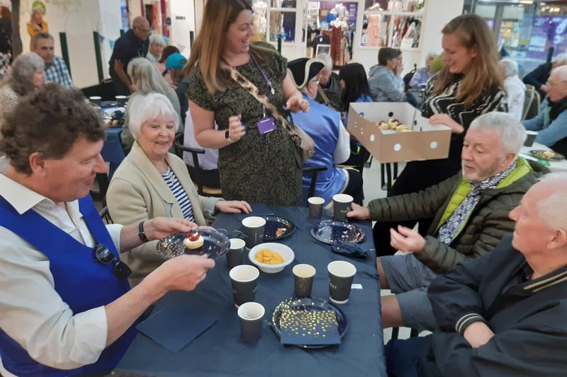 Worthing Dementia Action Alliance hosted afternoon tea for people living with dementia and their carers as part of a Dementia Action Week event in the Guildbourne Centre