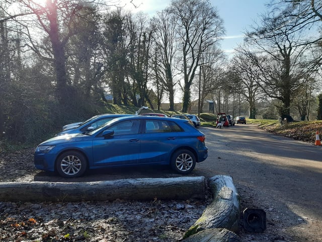 Pass through the small parking area beside Arundel Castle Cricket Ground.
