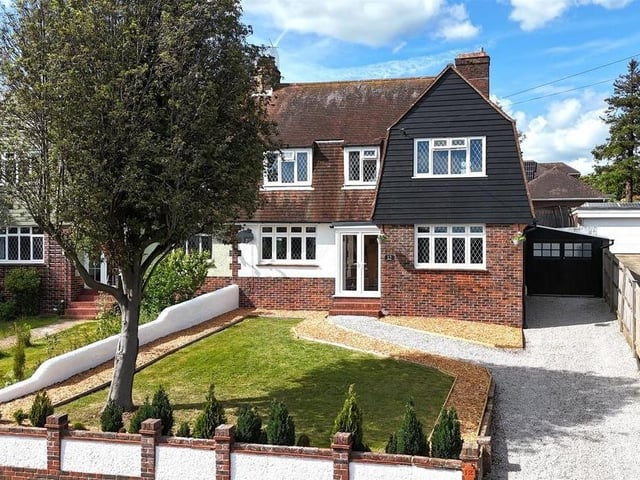 This distinctive Dutch barn style family home boasts spacious and versatile accommodation in a highly-sought-after position