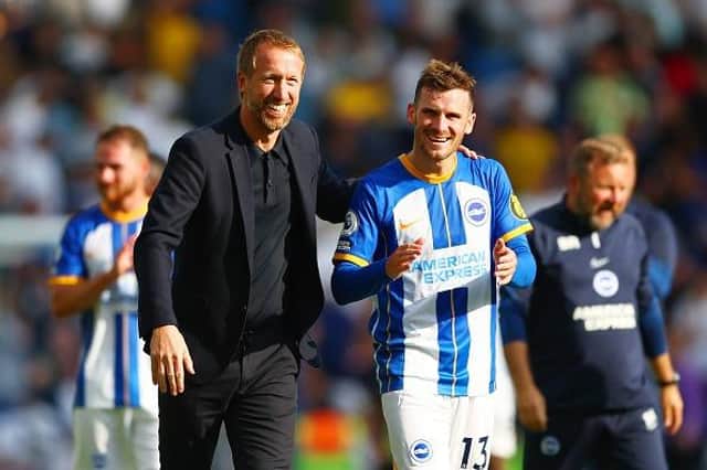 Brighton head coach Graham Potter and Pascal Gross following the Premier League win against Leeds United at the Amex Stadium