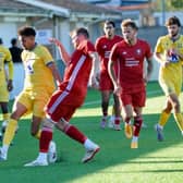 Hassocks in recent action againt Lancing | Picture by Stephen Goodger