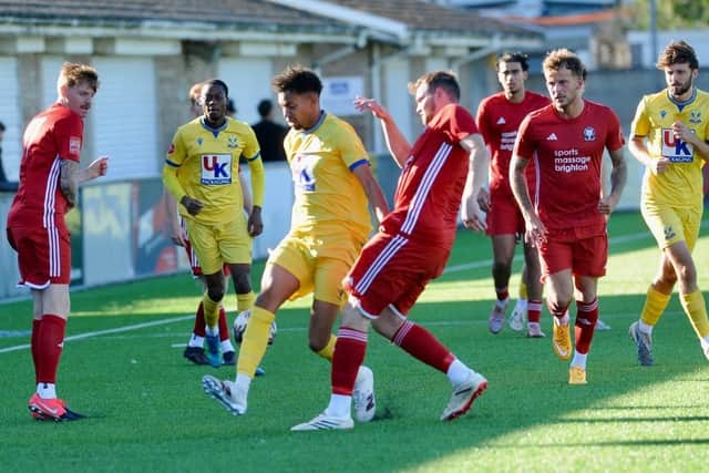 Hassocks in recent action againt Lancing | Picture by Stephen Goodger