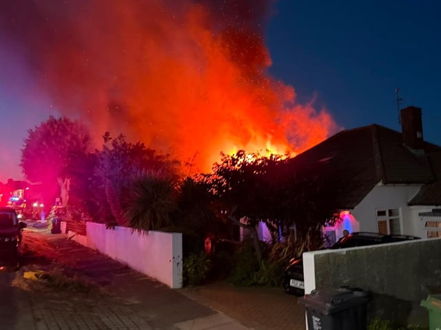 The house on fire on Lenham Avenue, Saltdean on the evening of Wednesday, August 12. All photos contributed with permission from Vicki Peaster