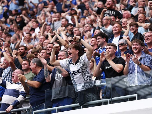 Everton fans celebrate the team's first goal scored by Iliman Ndiaye of Everton (not pictured) during the Premier League match