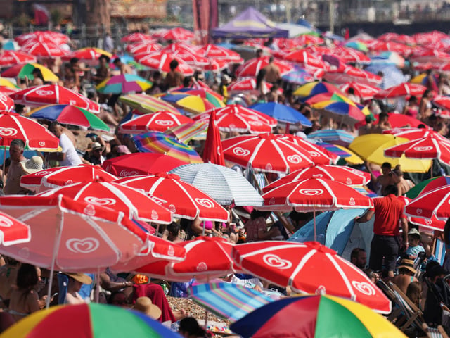 Thousands of people flocked to Brighton beach today (September 9) as temperatures reached 32C across parts of the county.