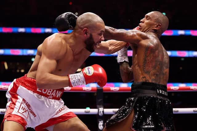 Chris Eubank Jr and Conor Benn exchange punches during the Middleweight fight. (Photo by Richard Pelham/Getty Images)
