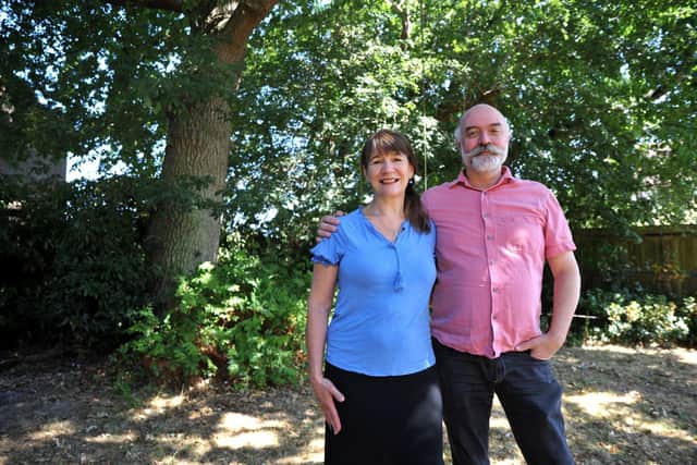 Sally and Peter Kemberare fighting to save two oak trees in the garden of their Cowfold home. S Robards SR2208081