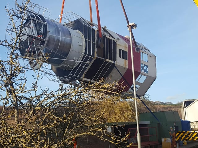 The lantern tower is lowered gently into position