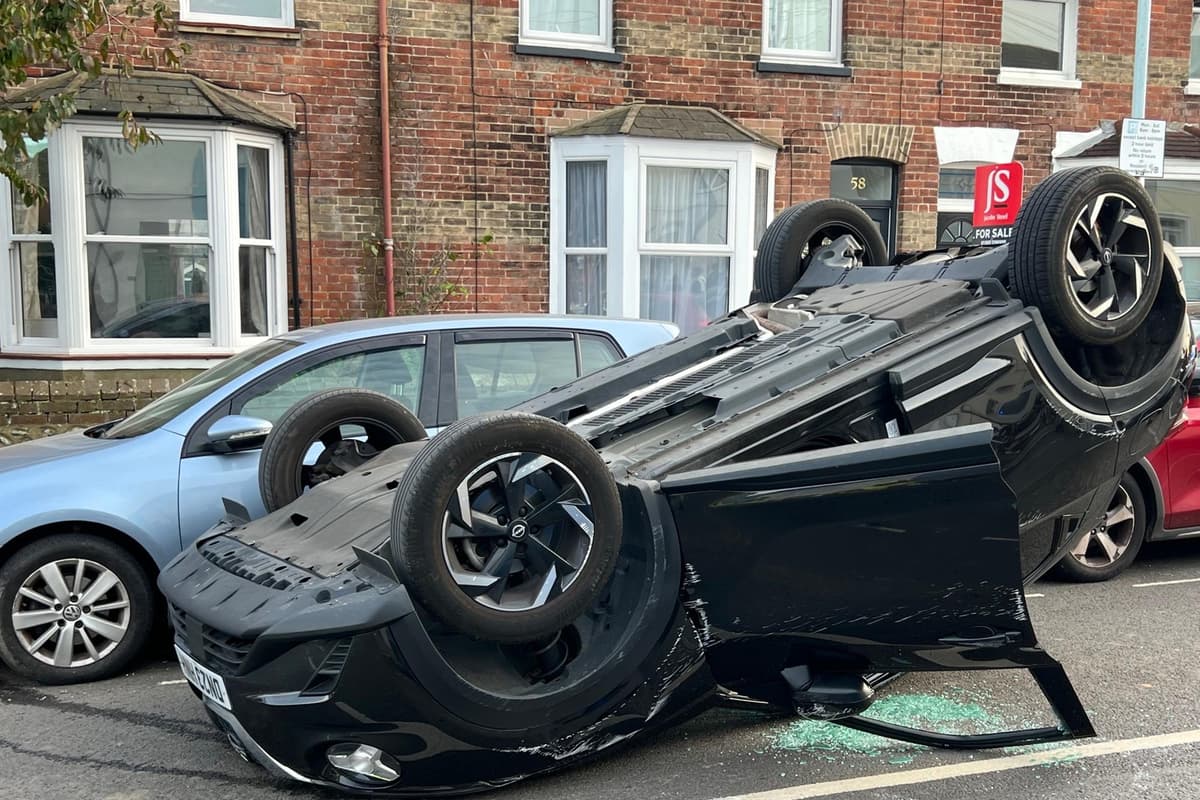Collide Into Collision in West Sussex town leaves car rolled on its side - emergency ...