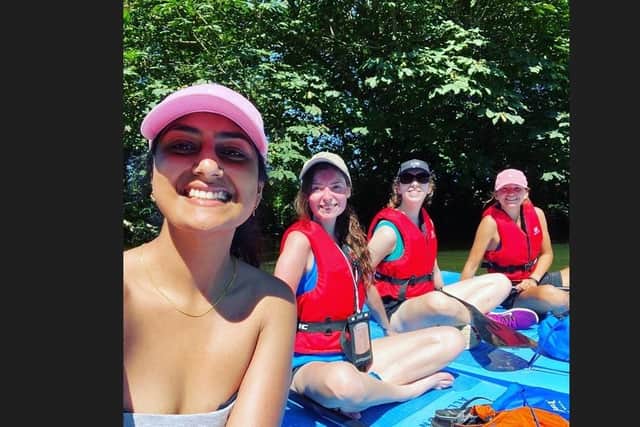Reporter India Wentworth enjoying the paddleboards with her friends
