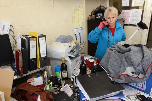 Lynn Butler in the office of Riverside Sheelmetal and Fabrication after flooding at Riverside Industrial Estate Littlehampton, on Friday, December 6, 2013