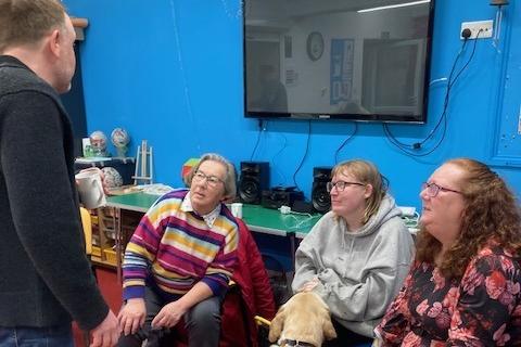 Comedians Chris McCausland and Jon Long with Sight Support Worthing volunteers and members at the charity's centre in Rowlands Road