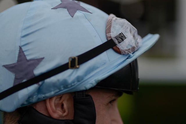 CHICHESTER, ENGLAND - AUGUST 05: Jockey Jason Hart with his goggles wrapped in clingfilm due to the rain at Goodwood Racecourse on August 05, 2023 in Chichester, England. (Photo by Alan Crowhurst/Getty Images):Images from a soggy Saturday at Glorious Goodwood 2023