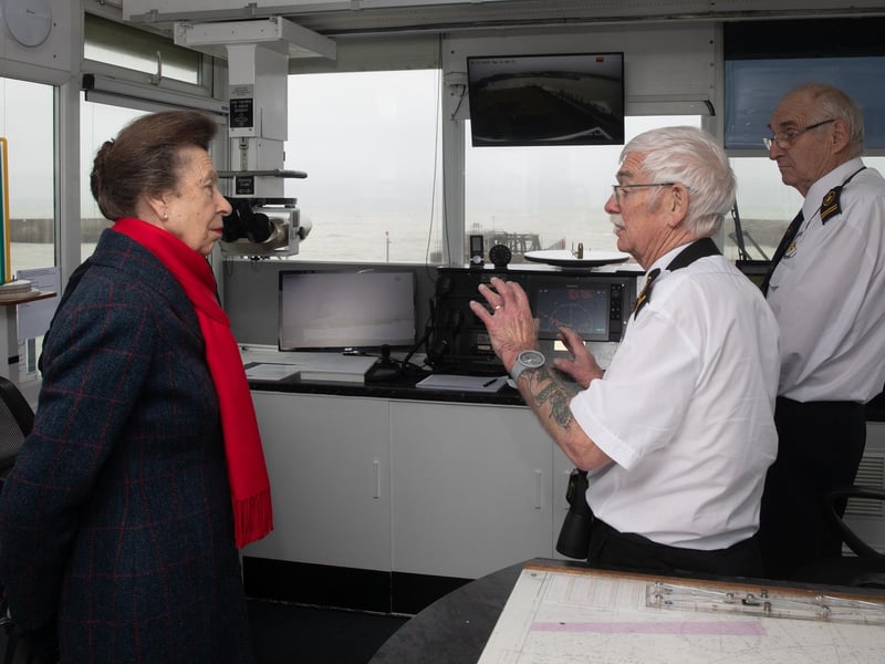 The Princess Royal chatting with the two duty watchkeepers, Dennis Holden, deputy station manager for training, and NCI Shoreham founding member Paul Cornford