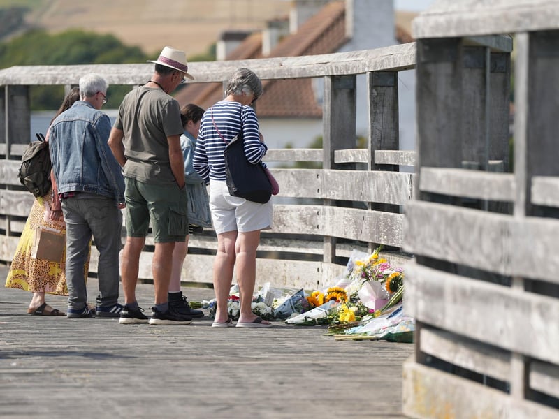 Floral tributes were laid on the Shoreham Old Tollbridge