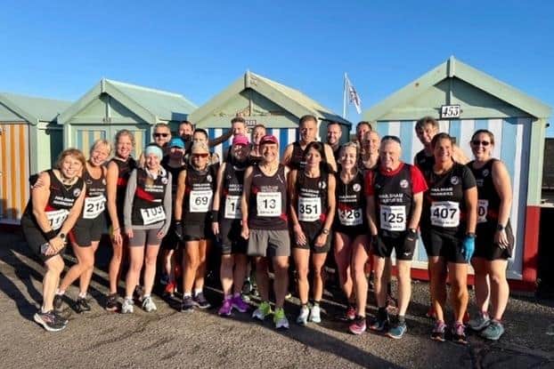Hailsham Harriers in front of the beach huts at Hove | Submitted picture