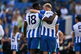 Danny Welbeck and Jan Paul van Hecke after Brighton's final game of 25-26, v Manchester United | Glyn Kirk/AFP via Getty Images
