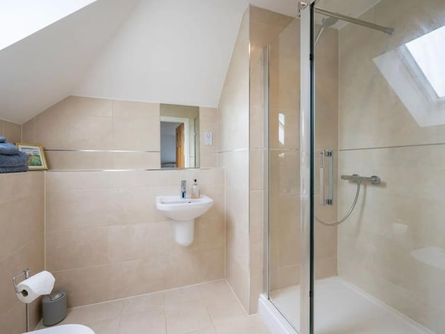 The home has a family bathroom and two en-suite bathrooms