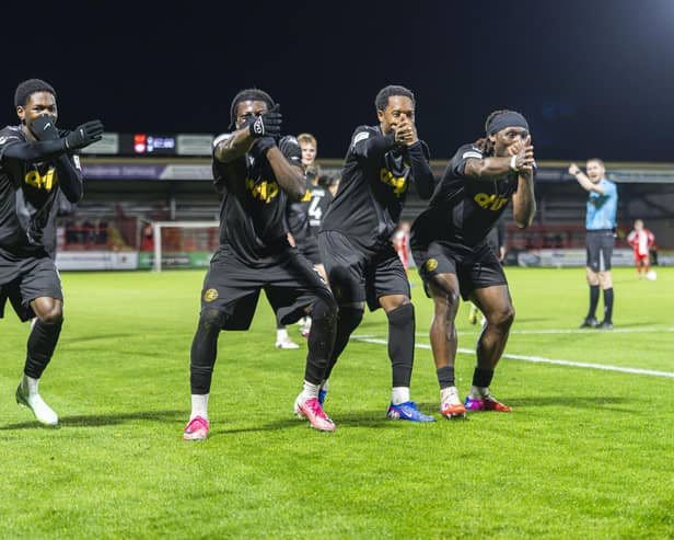 Worthing players celebrate in style at Kidderminster | Picture by Jay Wrighte