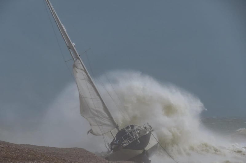 Yacht hots the beach at Hastings on Monday. Pic by Brian Bailey