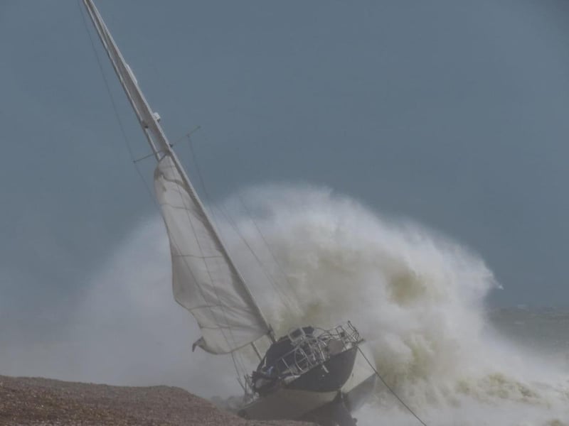Yacht hots the beach at Hastings on Monday. Pic by Brian Bailey