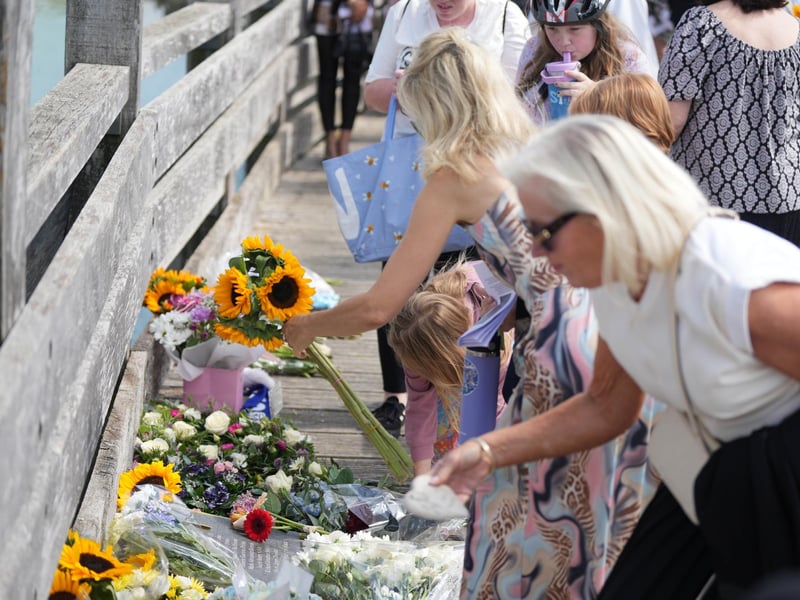Floral tributes were laid on the Shoreham Old Tollbridge
