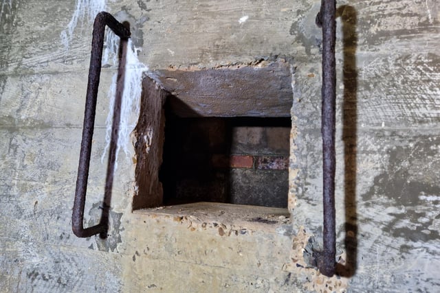 Pete Coe, one of the project leaders, and fellow former Royal Engineer Graham Cosham worked together to open the southern embrasure at the Ferring pillbox