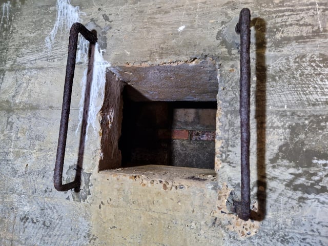 Pete Coe, one of the project leaders, and fellow former Royal Engineer Graham Cosham worked together to open the southern embrasure at the Ferring pillbox