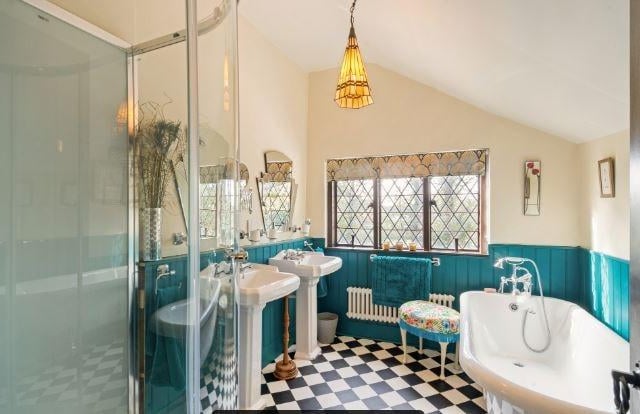 There is a refitted Victorian style bathroom suite with bath and separate shower cubicle, and also a shower room and a separate WC.