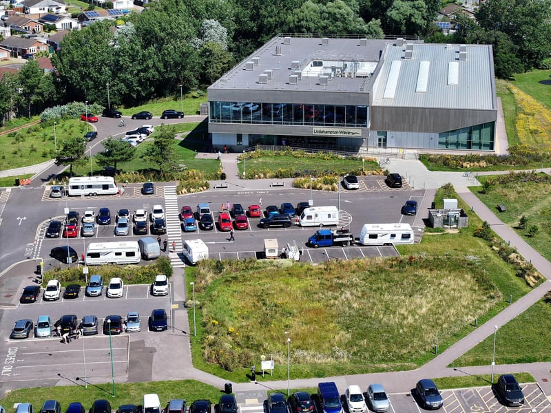 Multiple caravans have parked outside Littlehampton Wave in Sea Road and the police have been called.
