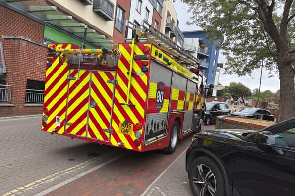 Once the immediate danger was over, a firefighter checked in on the library to brief the team looking after the displaced residents. Photo: Visit Horsham